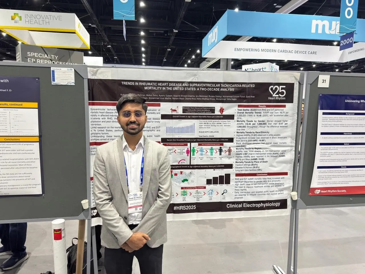 Asad Cheema with a poster at Heart Rhythm 2025, eight months after taking Level 1.